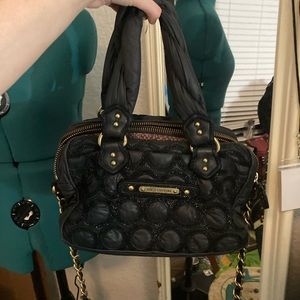 Black quilted bag heavy no signs of wear heavy feels very expensive
